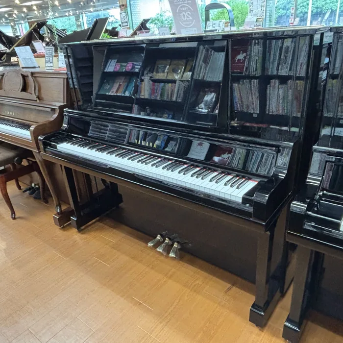 Yamaha UX30A upright piano in polished ebony