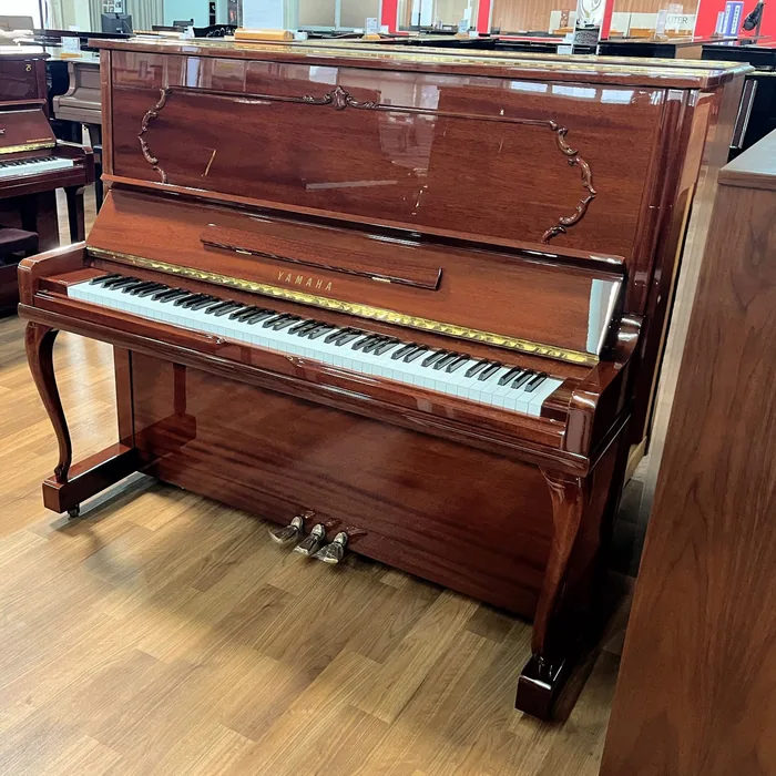 Yamaha W3A upright piano in mahogany with carved legs
